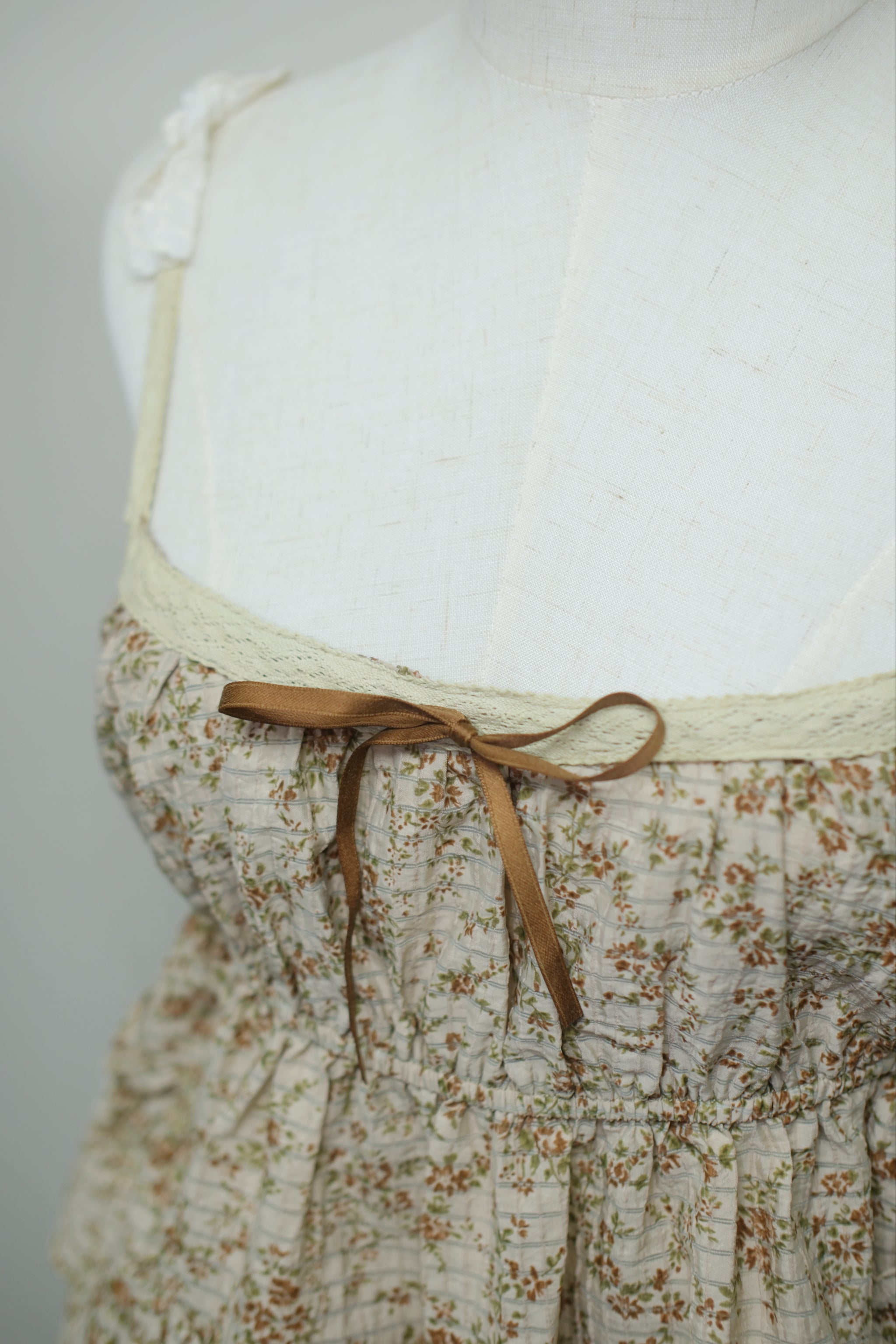 Beige Floral Ruffled Layer Tie Blouse