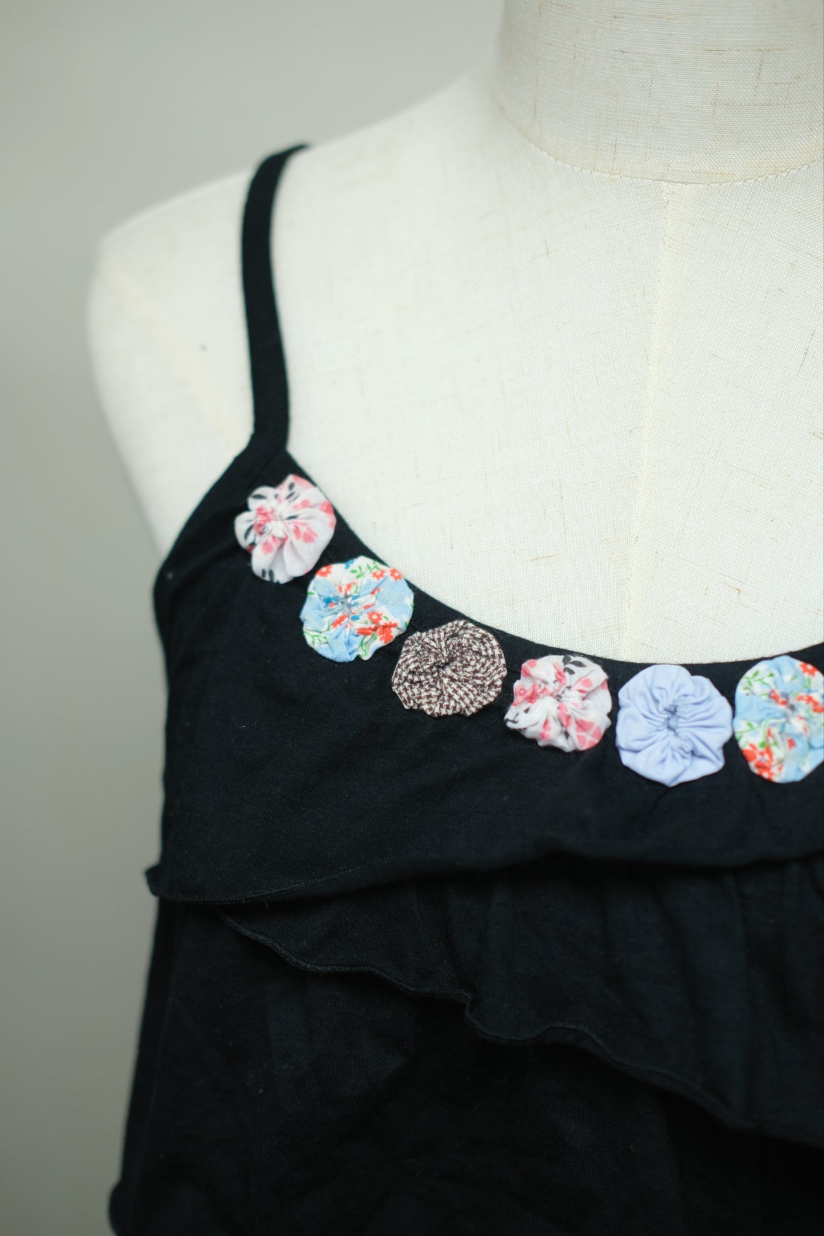 Black Tiered Ruffle Wear With Colourful Fabric Flowers