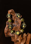 Embroidered Bracelet with Green Cat's Eye Beads