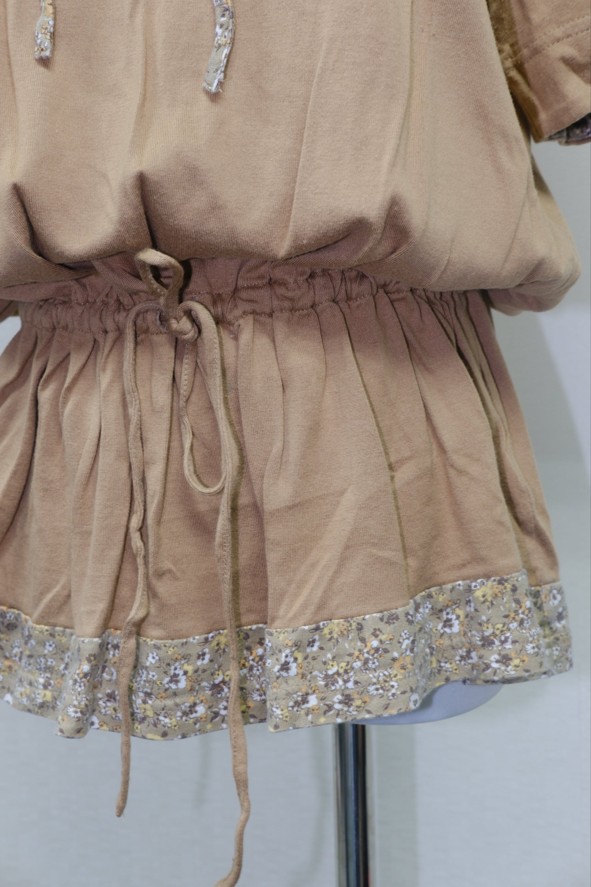 Tan Short Sleeve Peplum Top with Floral Neckline