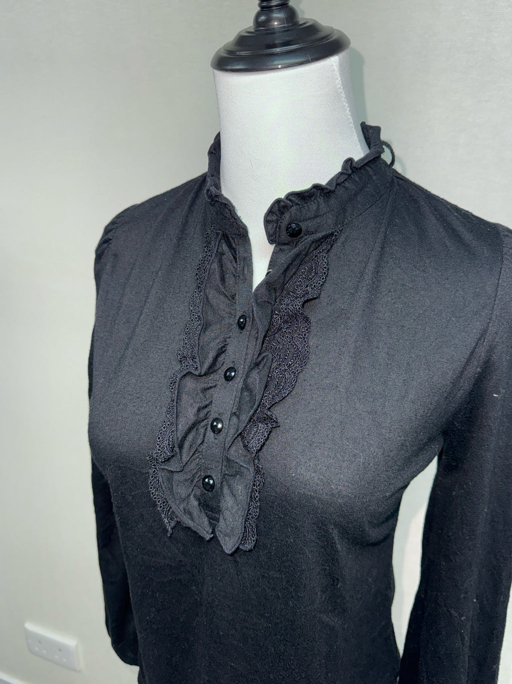 Black Ruffle Front Henley Blouse
