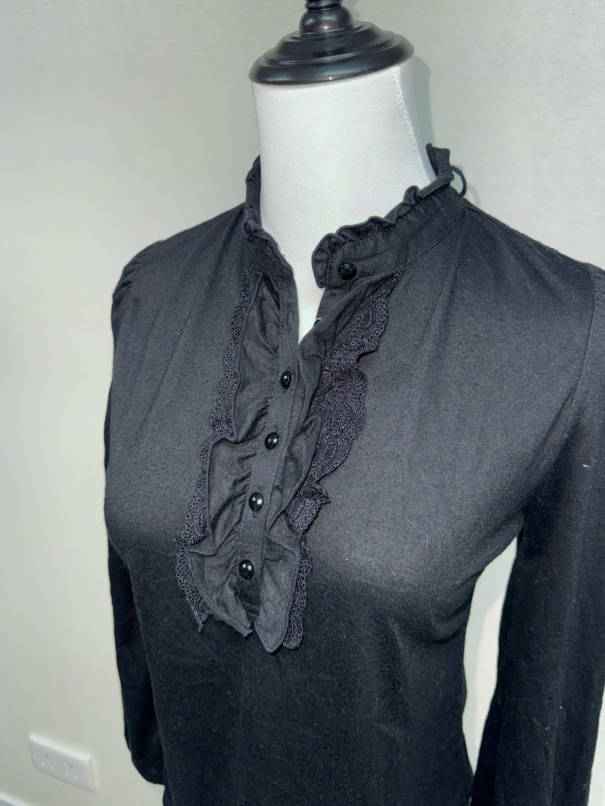 Black Ruffle Front Henley Blouse