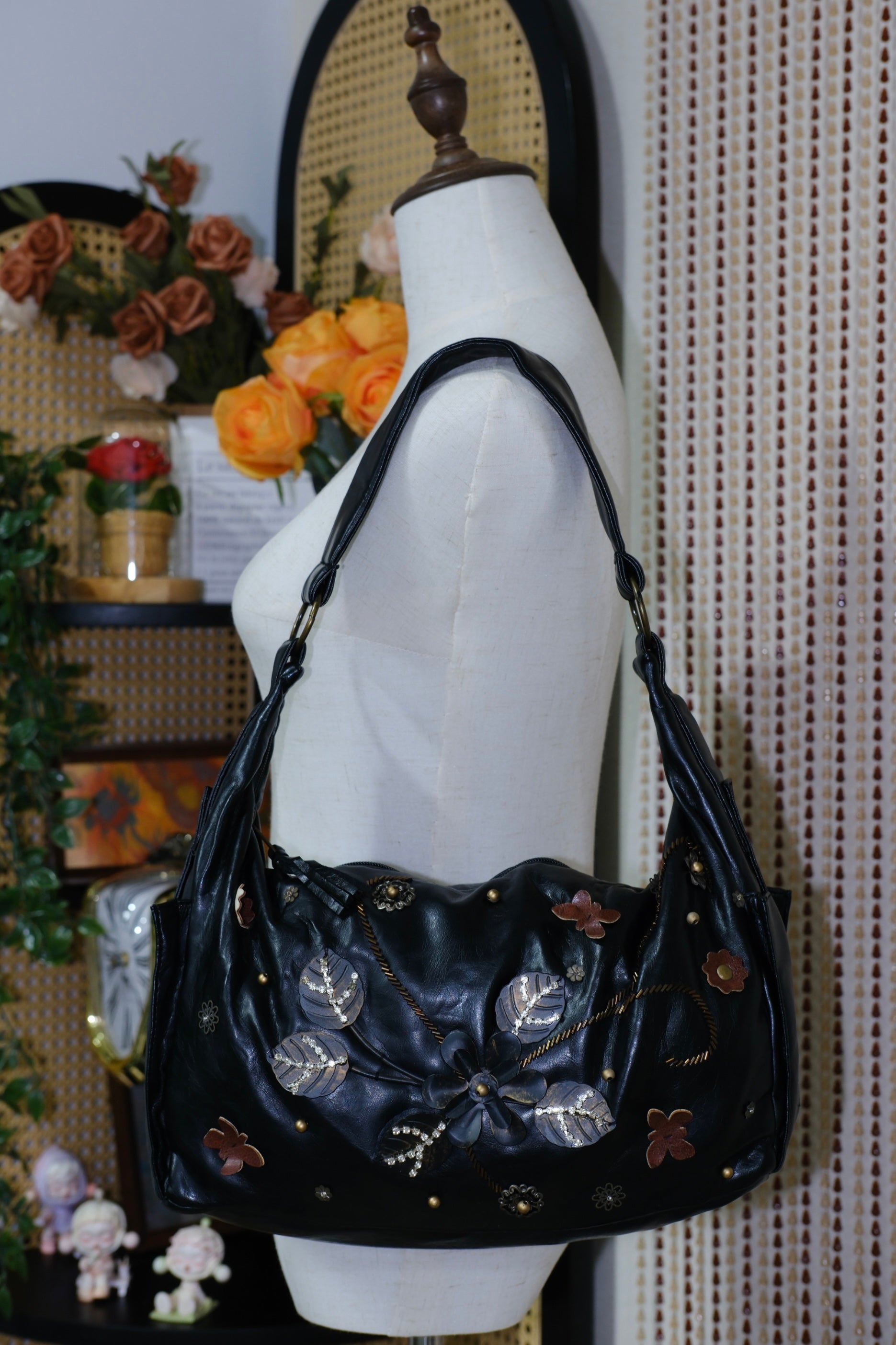 Black Leather Shoulder Bag with Leaf Rhinestone Details