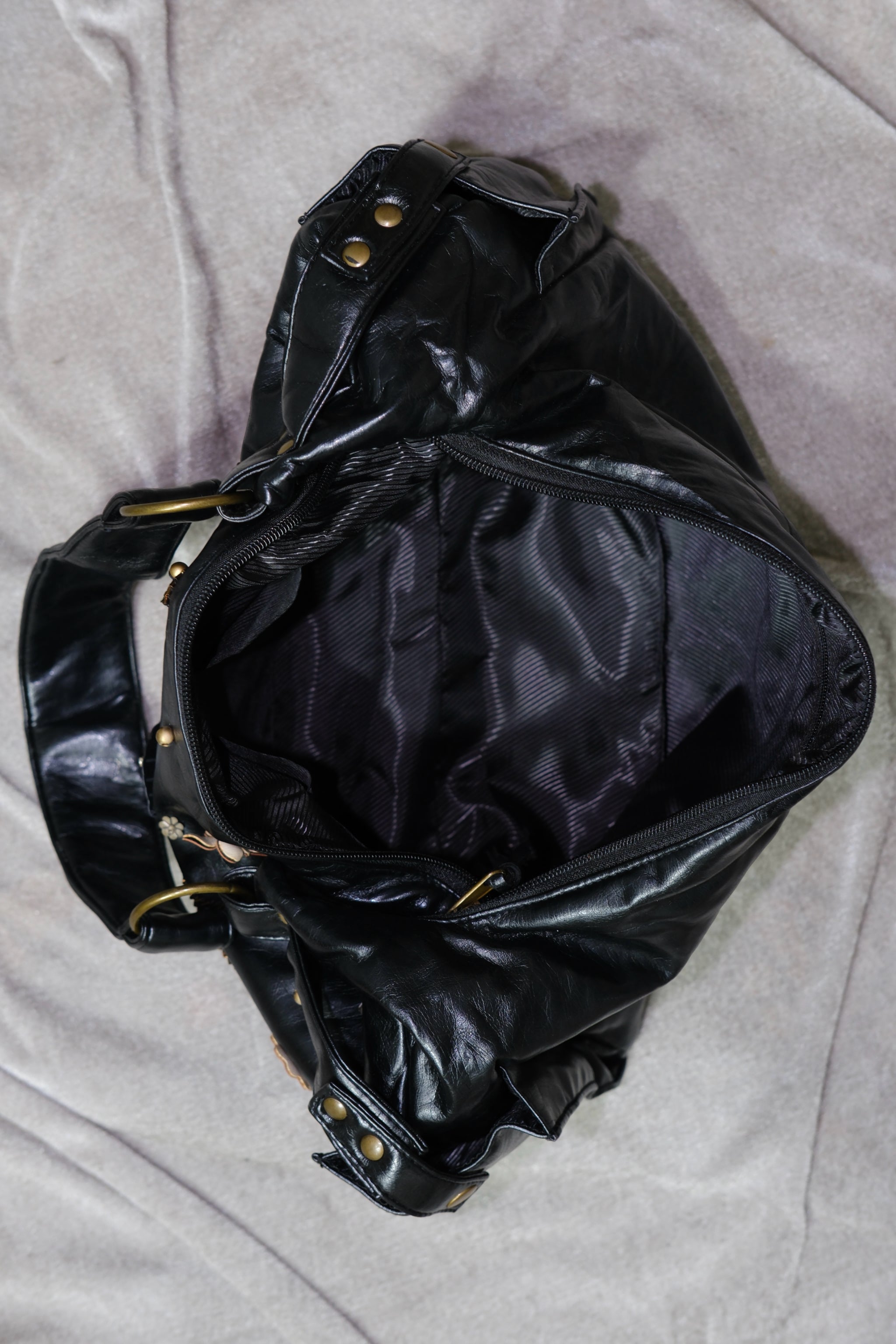 Black Leather Shoulder Bag with Leaf Rhinestone Details