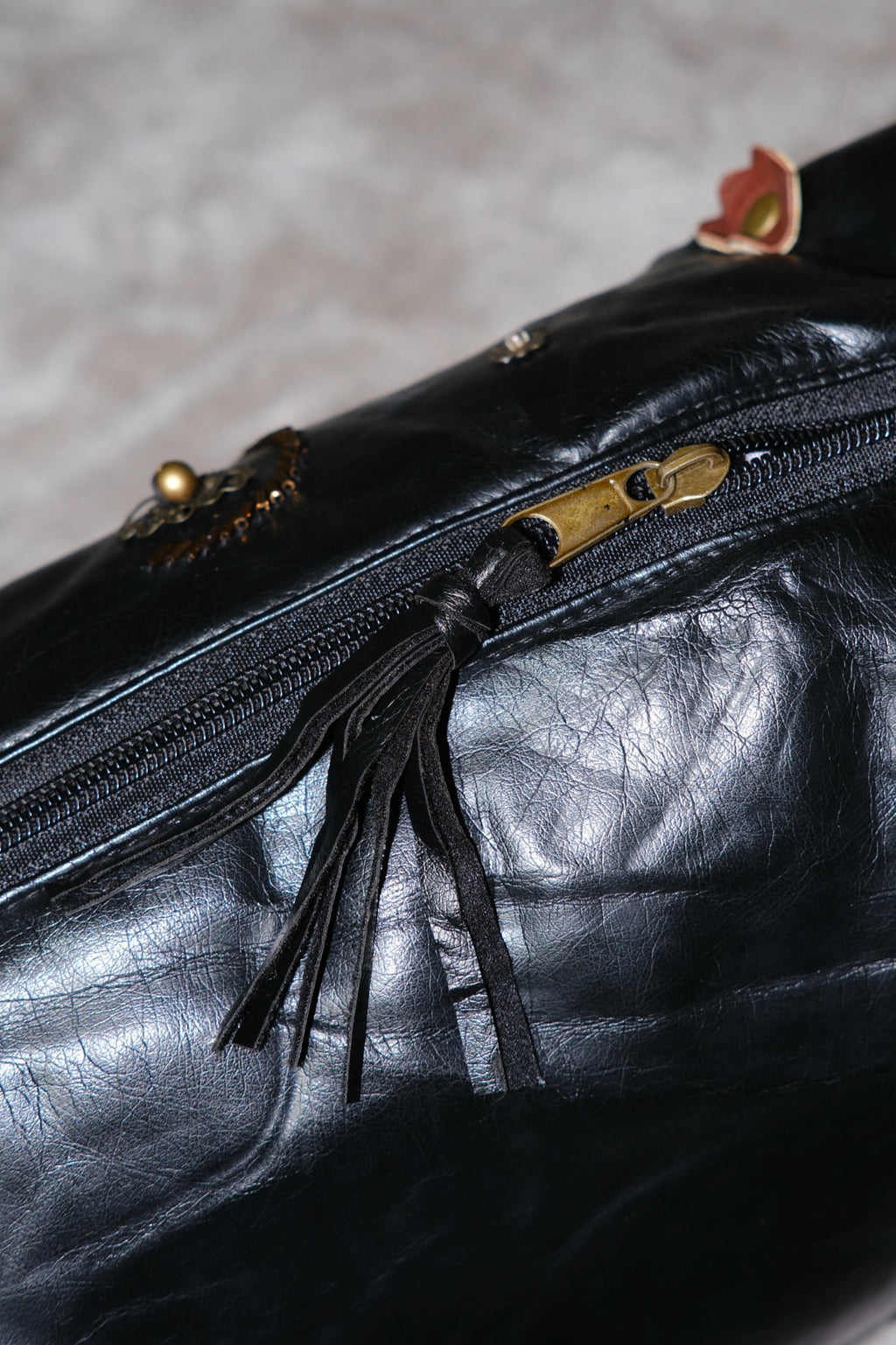 Black Leather Shoulder Bag with Leaf Rhinestone Details