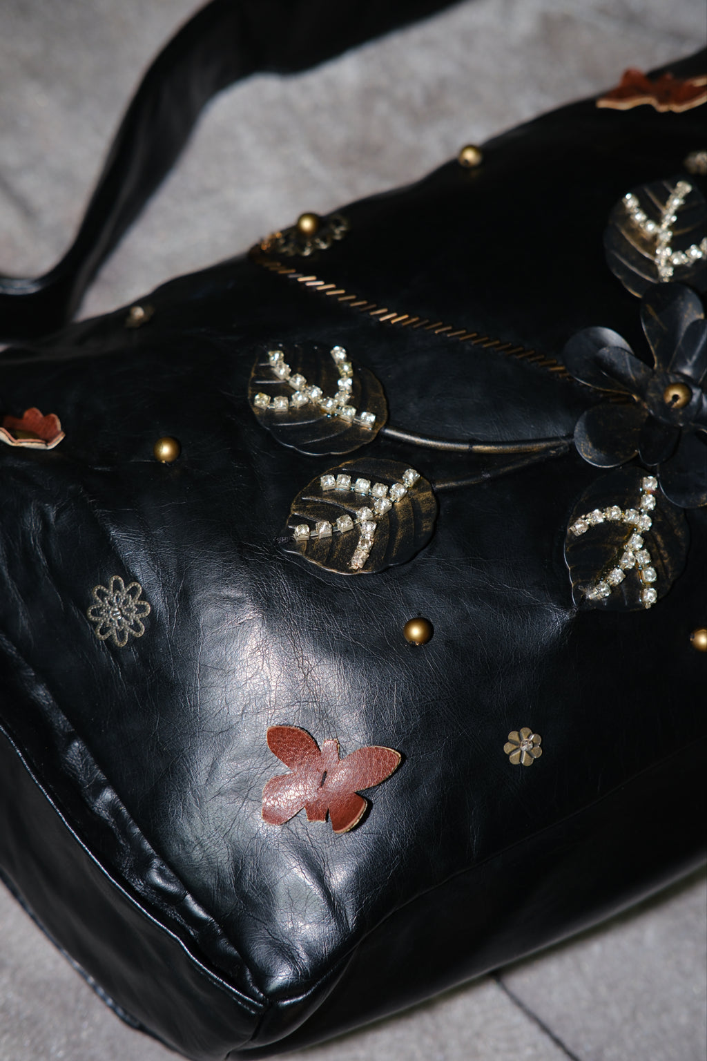 Black Leather Shoulder Bag with Leaf Rhinestone Details