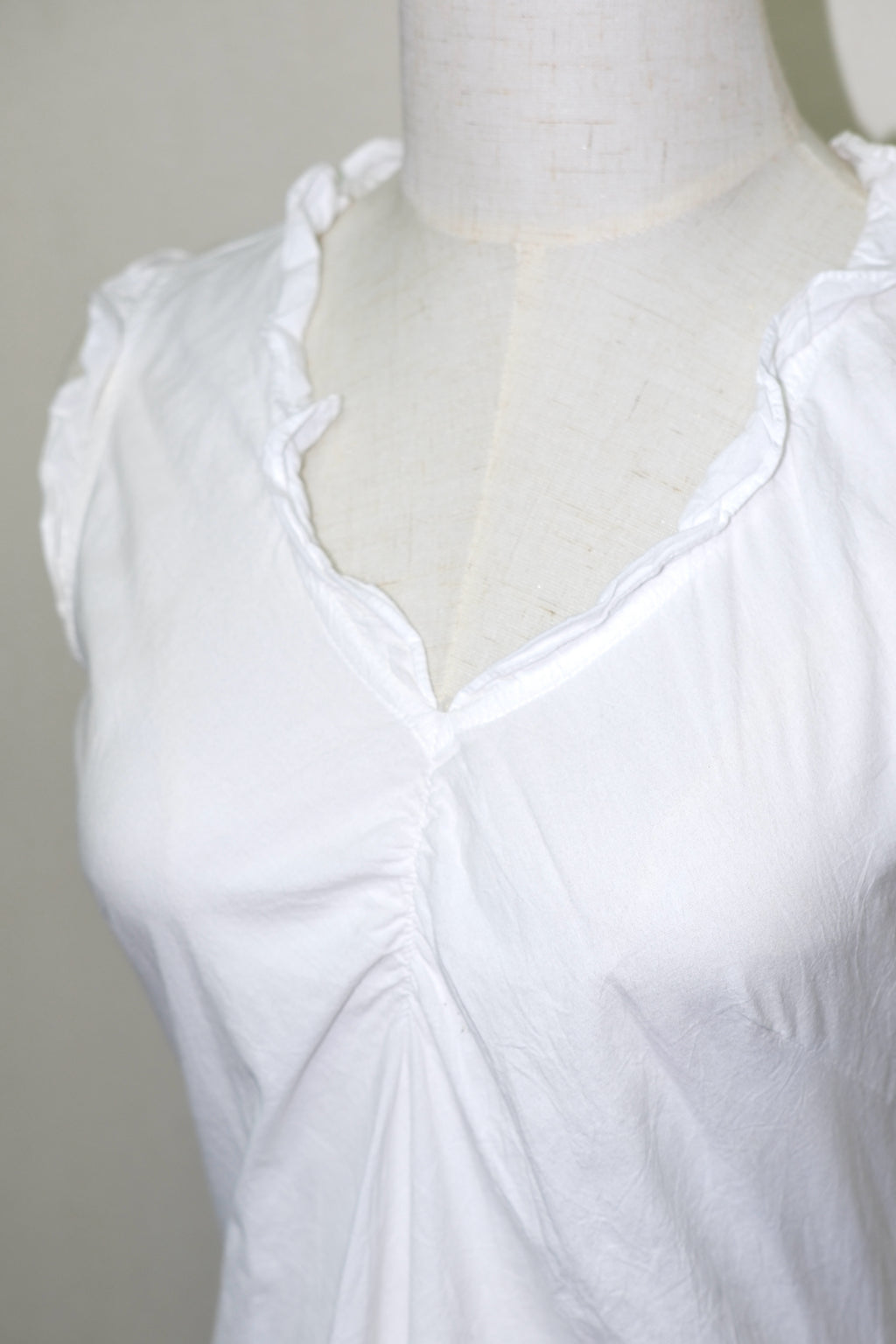 White Ruffled V-Neck Sleeveless Top